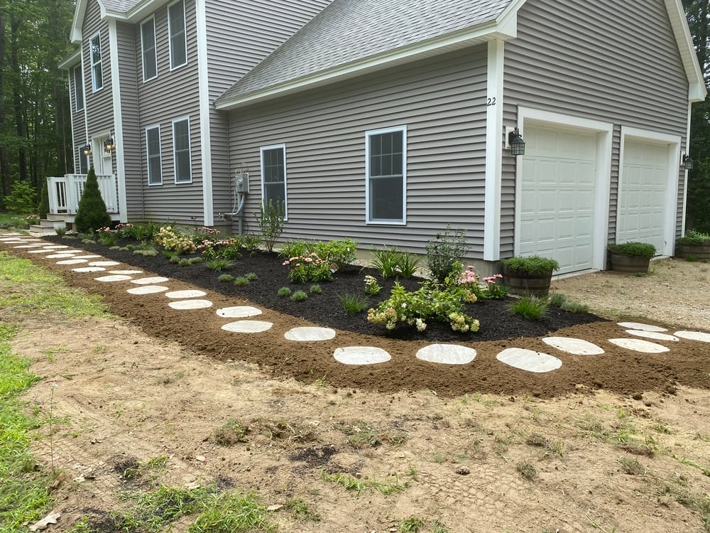 Garden next to stone walkway